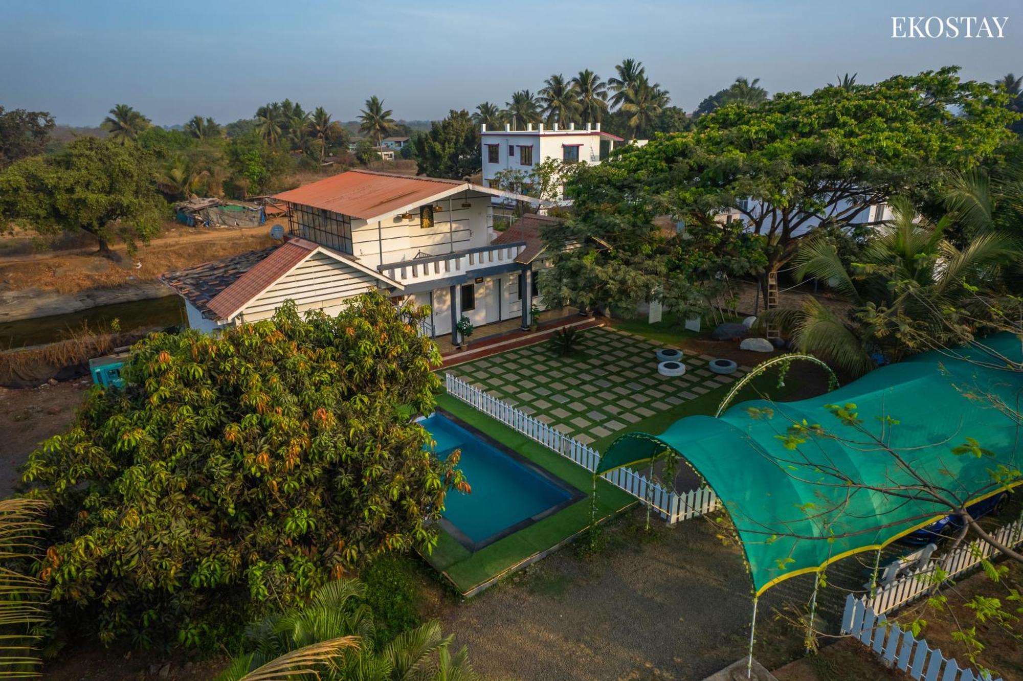 Eko Stay- Lakefront Villa Alibag Exterior photo